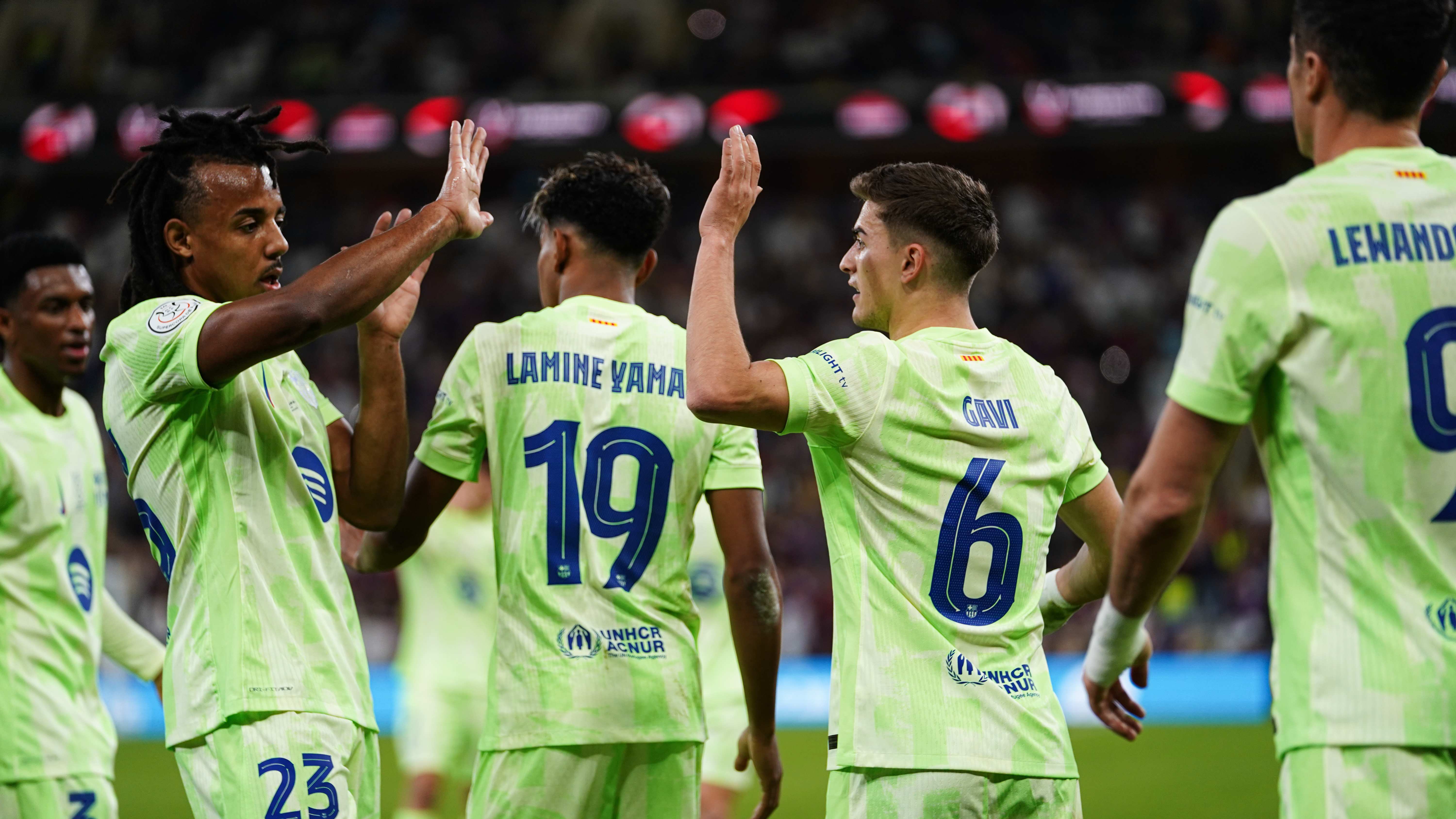 Barcelona's players celebrate scoring against Athletic Clu