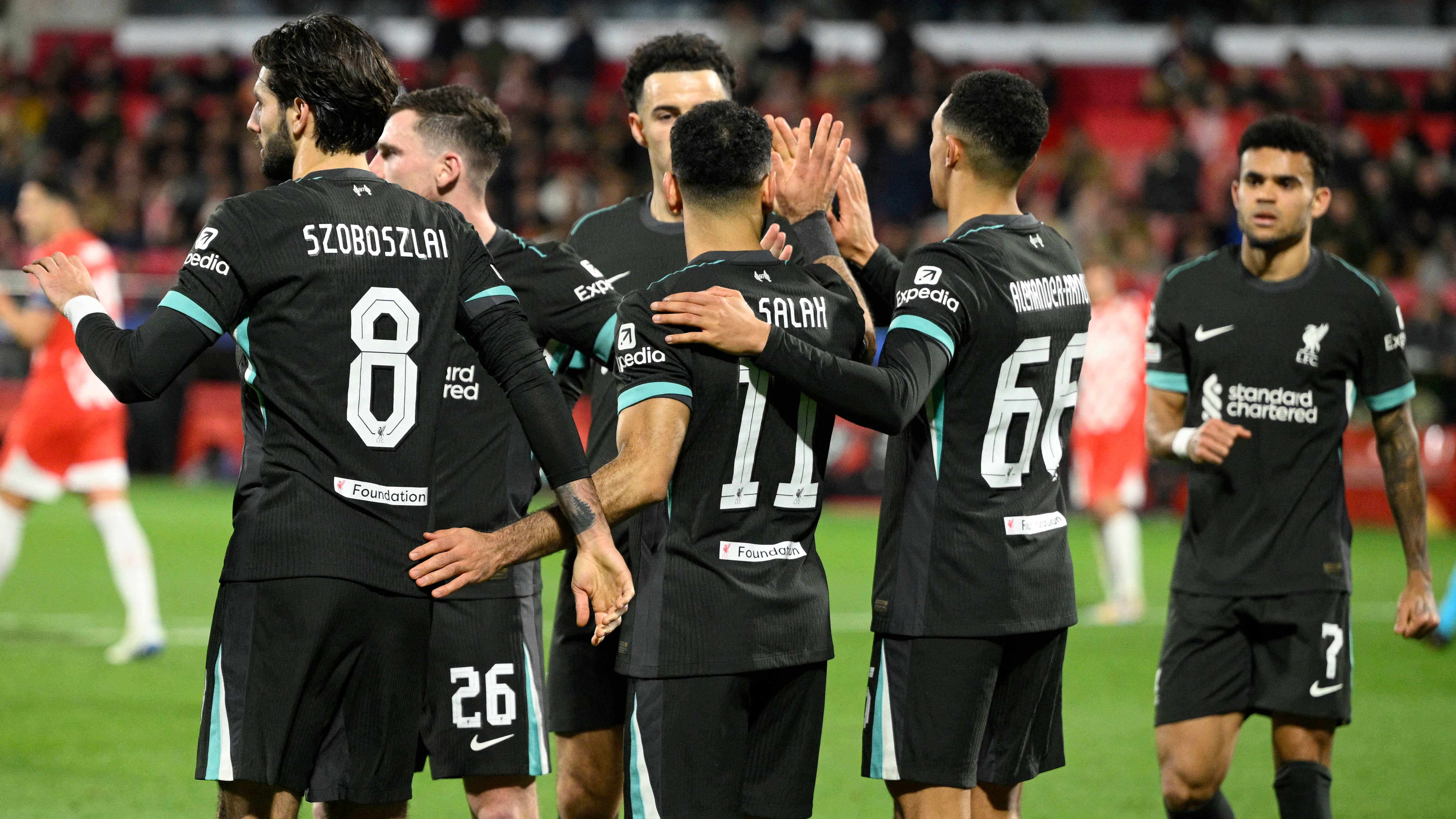 Liverpool celebrate scoring against Girona in the Champions Leagu